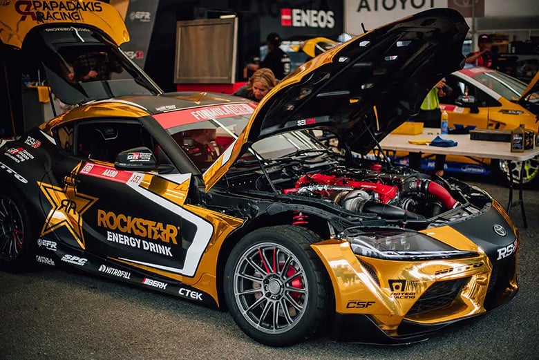 BMW B58 Supra Papadakis Racing A90 Toyota Supra with bonnet open showing the BMW B58 engine, built for drift competition