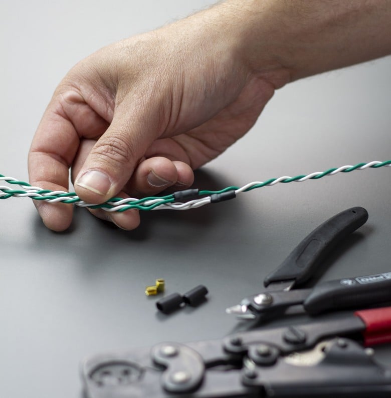 CAN bus analyser connected to a vehicle wiring harness