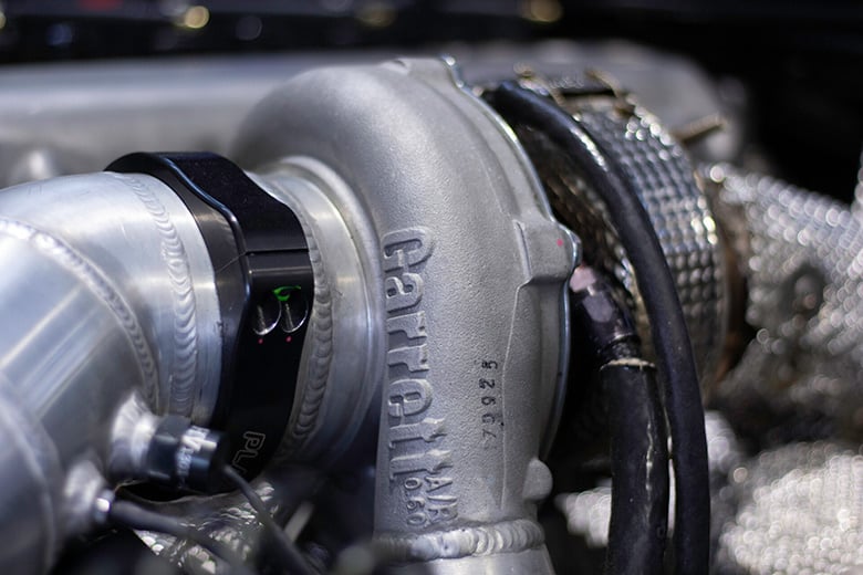 Garrett turbocharger installed in a performance diesel engine bay