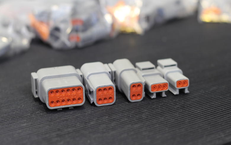 DTM series connector options lined up on workshop bench