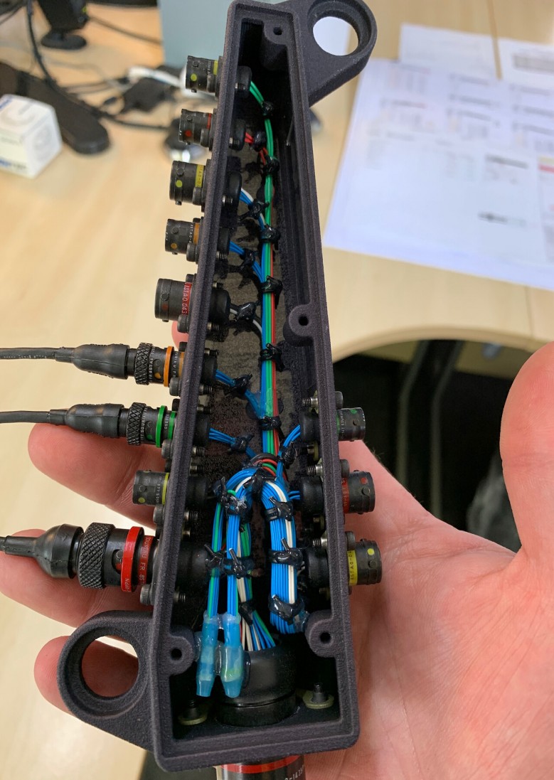Professional motorsport wiring breakout box built using Tefzel M22759/32 wire for a competition wiring harness