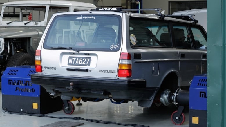 Rear view of the Volvo 240 on the hub dyno during ZF 8HP transmission testing.