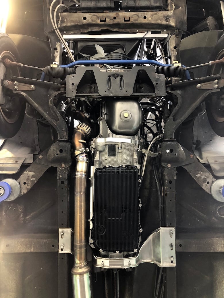 Underside of the Volvo 240 showing the completed ZF 8HP transmission and crossmember installation.