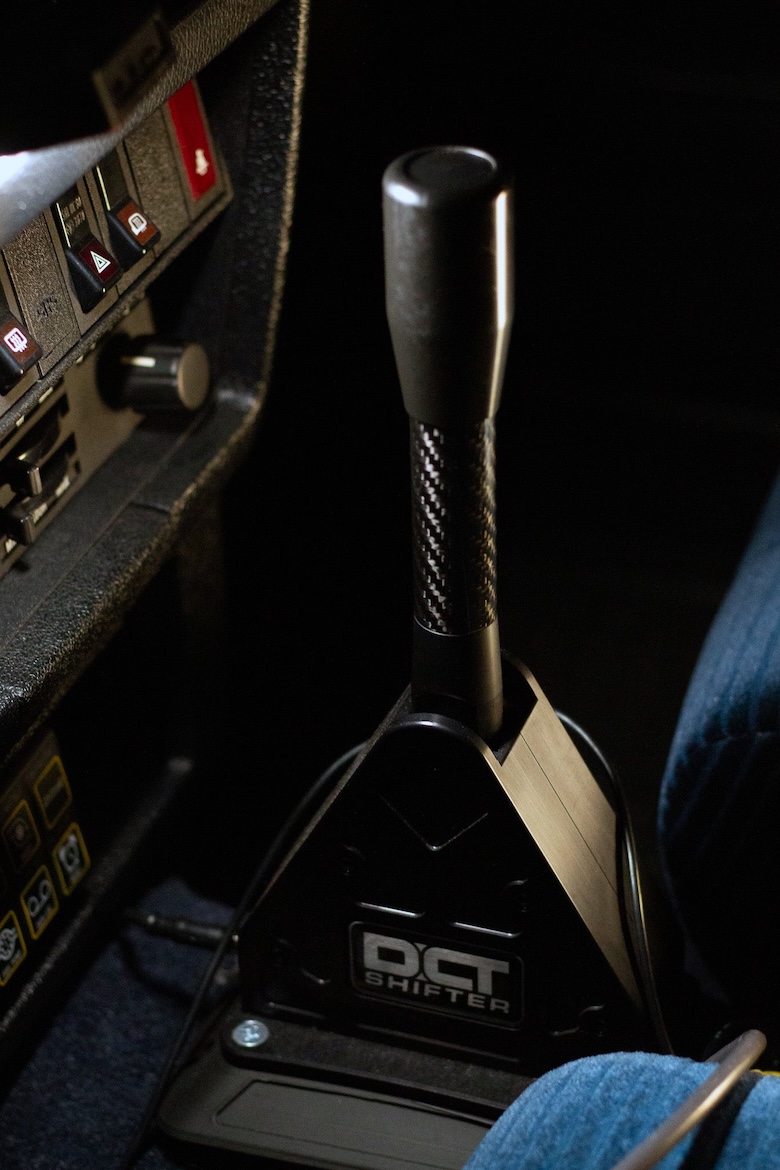 DCT shifter installed in the Volvo 240 on a custom pedestal with display and control dial.