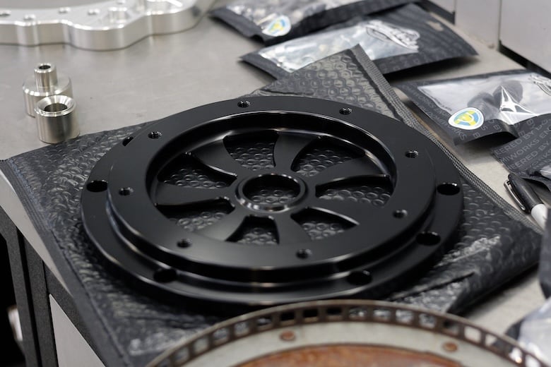 DomiWorks adapter components for fitting a ZF 8HP transmission to a Volvo Redblock engine.