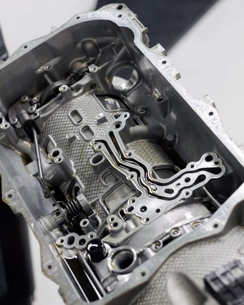ZF 8HP transmission internals exposed with the oil pan and valve body removed.