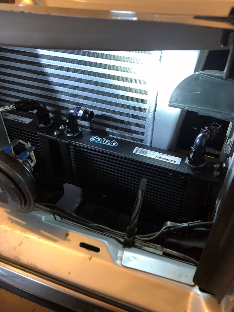 Setrab transmission oil cooler mounted ahead of the Volvo 240 radiator.