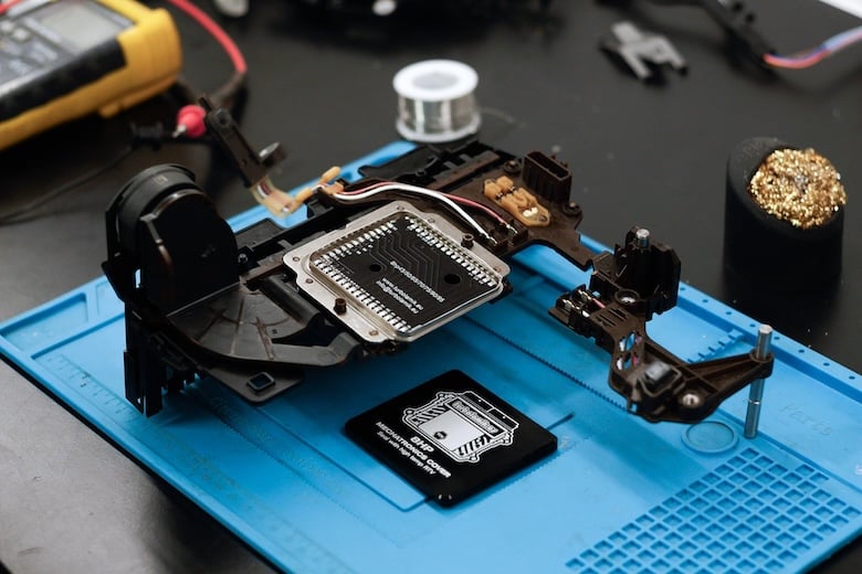 ZF 8HP mechatronics assembly on the workbench with the TurboLamik replacement control board.