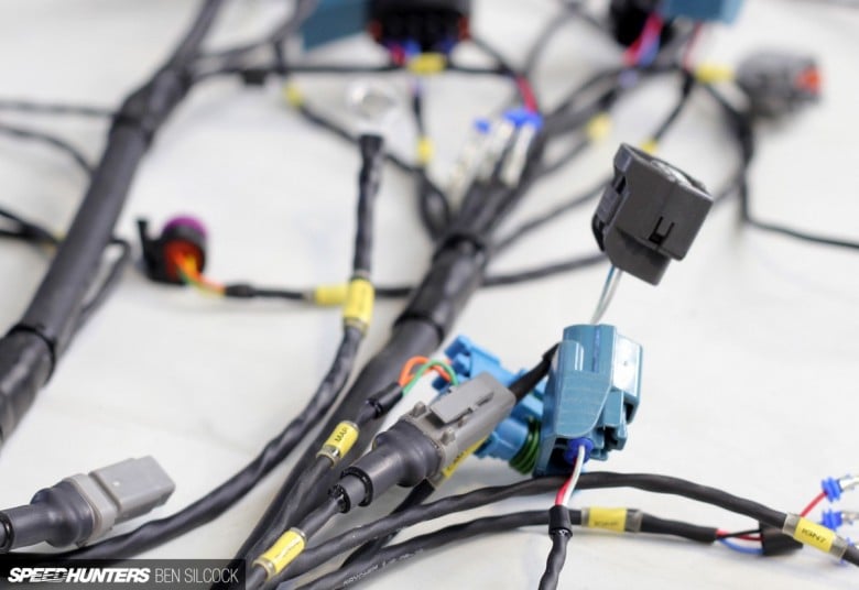 motorsport wiring harness with yellow labels 1 1200x800