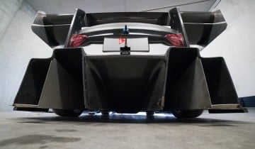 How Does Downforce Make You Faster AND Slower?